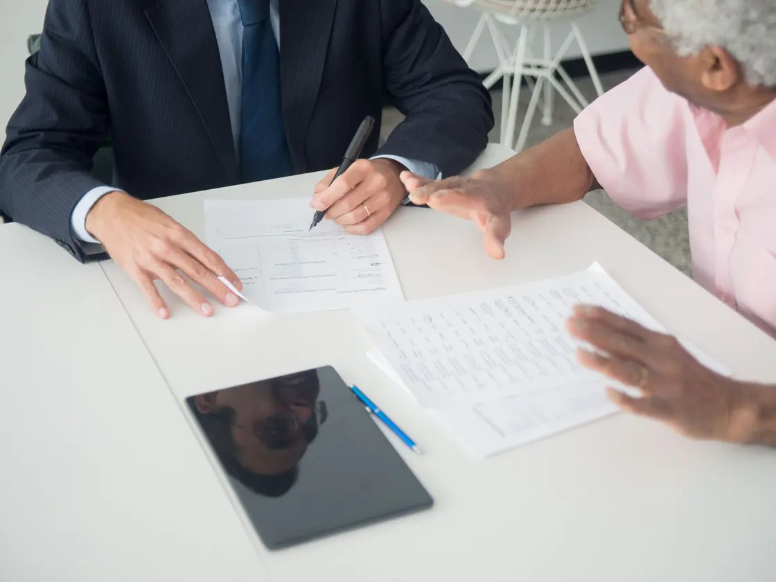 An advisor reviewing a permanent life insurance policy with a client