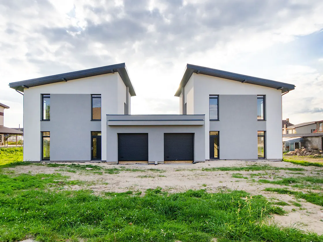 A pair of modern homes being appraised for mortgage financing